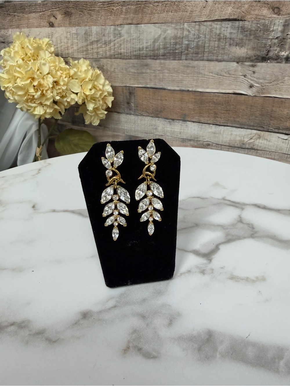 Gold Tone chandelier earrings w/Marquise cut leaf design OS